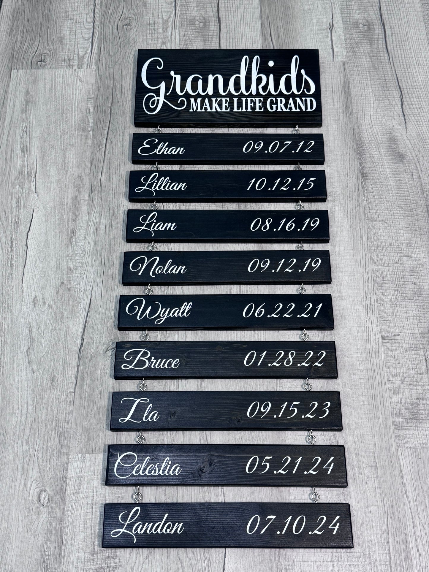 "Grandkids Make Life Grand" wood sign