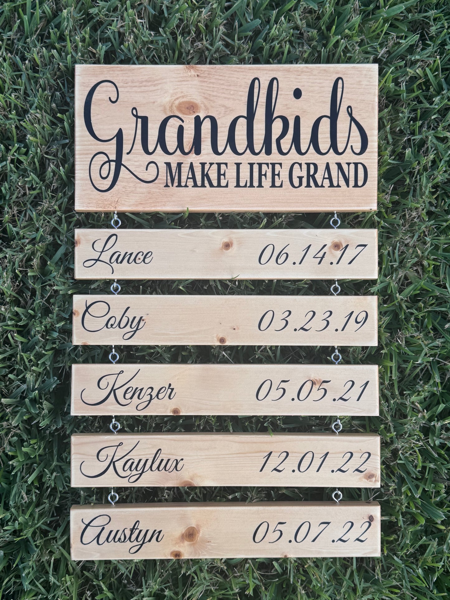 "Grandkids Make Life Grand" wood sign