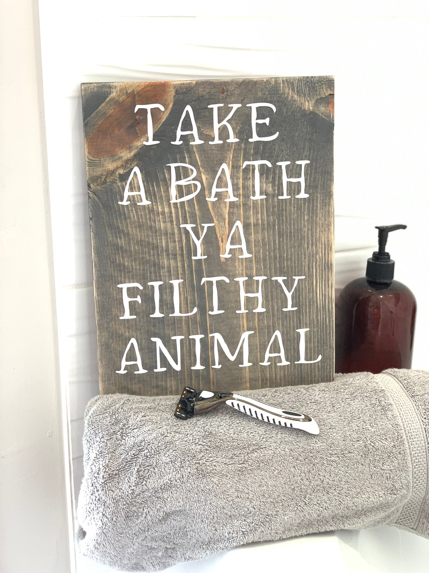 Take a bath ya filthy animal sign