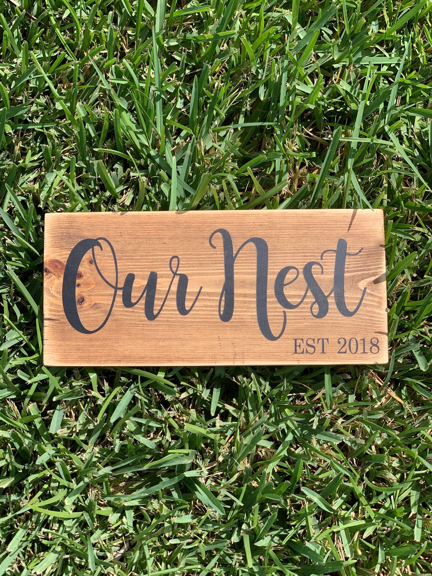 Our Nest Wood sign