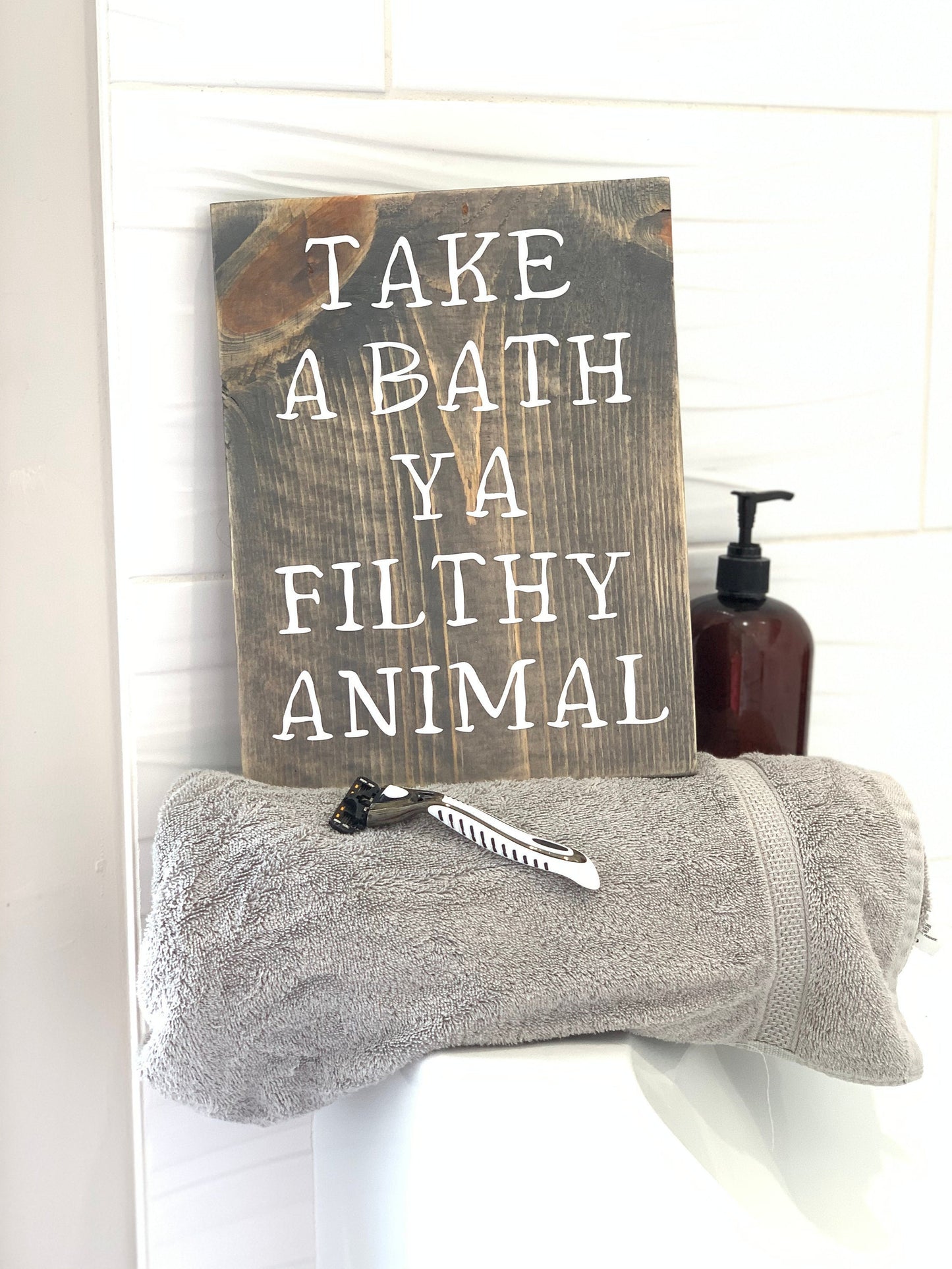 Take a bath ya filthy animal sign